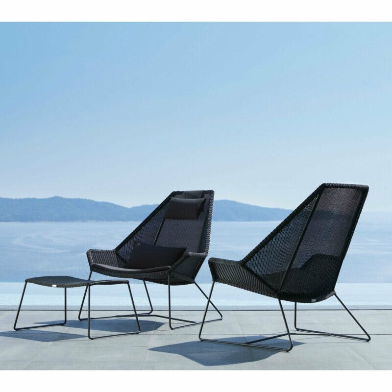 Cane-line "Breeze" Loungesessel mit hoher Rückenlehne und Loungehocker, Polyrattan schwarz