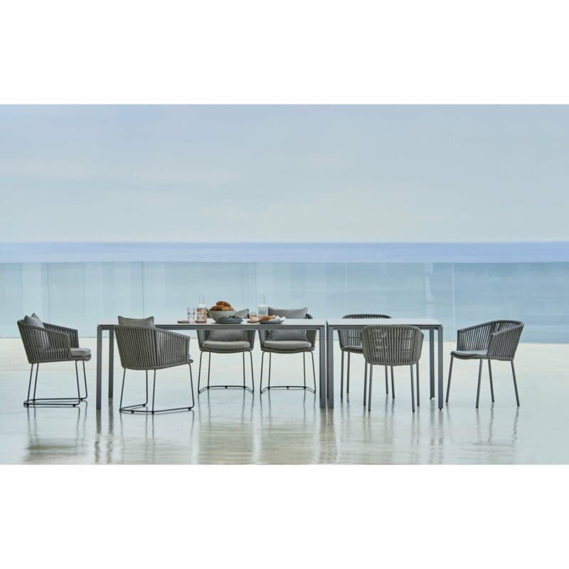 Cane-line Gartenstuhl und Stapelstuhl "Moments" und Gartentisch "Pure"