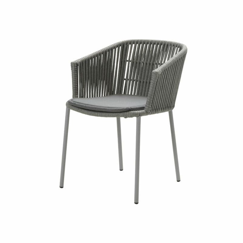 Cane-line Stapelstuhl "Moments" mit grauen Kissen