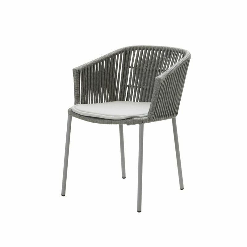 Cane-line Stapelstuhl "Moments" mit hellgrauen Kissen