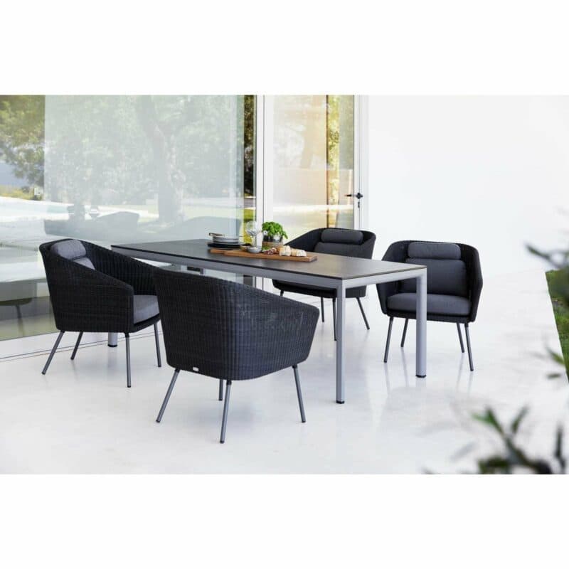 Cane-line "Mega" Diningsessel, Geflecht graphit, AirTouch Kissen grau mit Gartentisch "Drop"