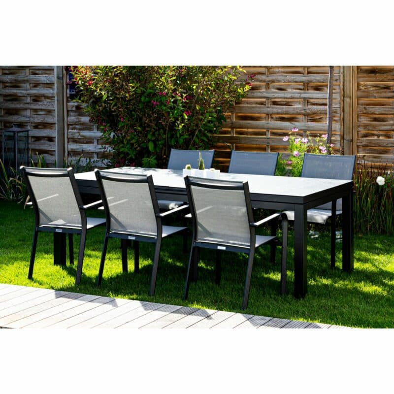 Jati&Kebon Gartenmöbel-Set mit Tisch "Gabon" und 6 Stapelsesseln "Dransy", Alu eisengrau, Tischplatte Glas, Bespannung Textilen silbergrau