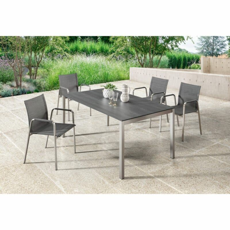 SIT Mobilia "Marseille" Stapelsessel, Gestell Edelstahl gebürstet, Sitzfläche Batyline® Eden black, "Etna" Gartentisch Edelstahl/HPL