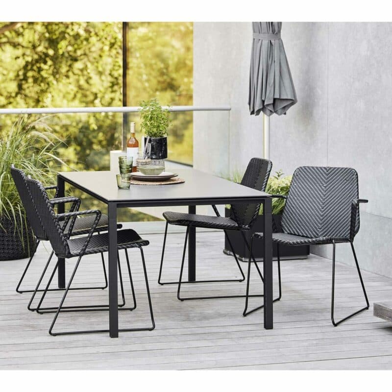 Cane-line "Vision" Gartenstuhl, Geflecht schwarz/anthrazit und Gartentisch "Pure"