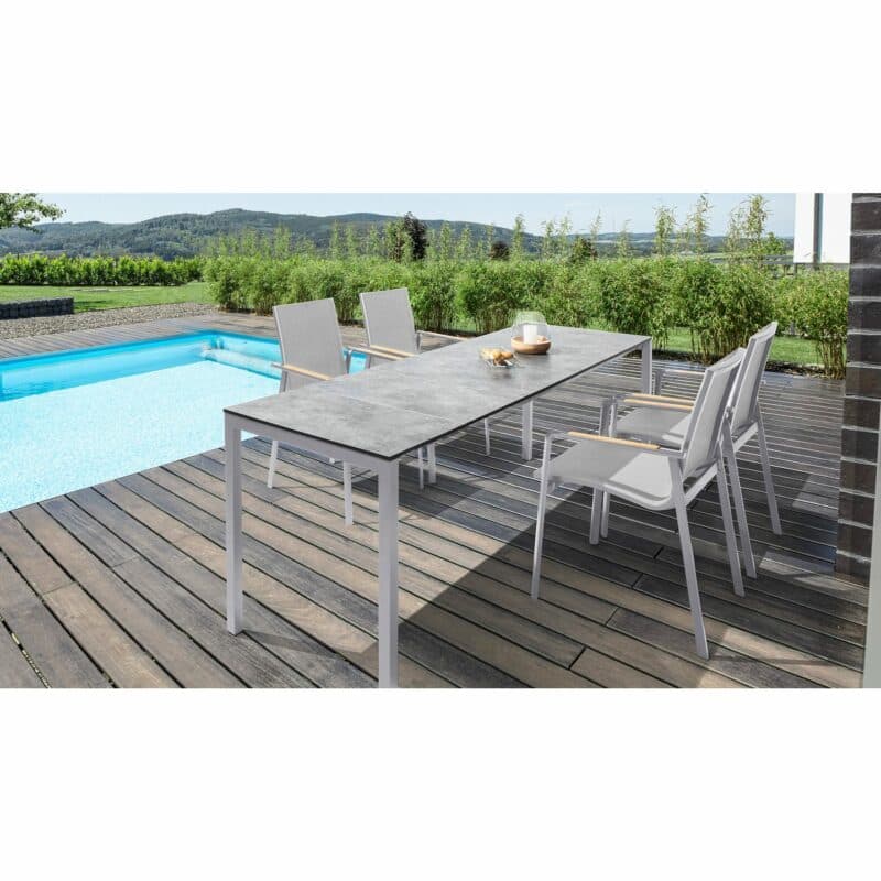 Kettler "Diamond" Stapelsessel mit "Cubic" Ausziehtisch, Gestelle Alu silber, Sitz Textil hellgrau, Tischplatte HPL anthrazit, 140/175/210x70 cm