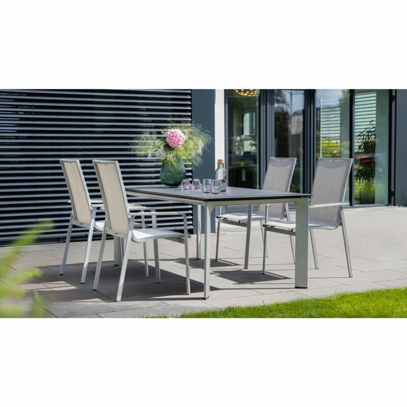 Kettler "Diamond" Stapelsessel, hohe Rückenlehne, Gestell Aluminium silber, Sitzfläche Textilgewebe hellgrau, Gartentisch 180x95 cm, Tischplatte HPL Jura anthrazit