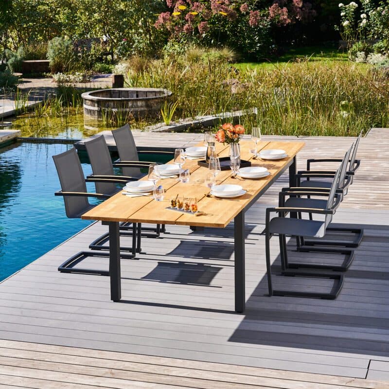 CASA DOMA "Mineo/Varano" Gartenmöbel-Set 7-tlg., Gestelle Edelstahl anthrazit, Sitzfläche Sunproof® Sling schwarz-silber, Armlehnen Teak, Ausziehtisch Tischplatte Teak, 210/310x100 cm
