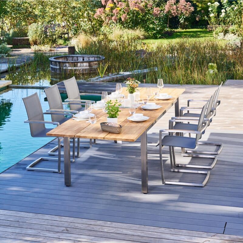 CASA DOMA "Mineo/Varano" Gartenmöbel-Set 7-tlg., Gestelle Edelstahl gebürstet, Sitzfläche Textilgewebe Sunproof® Sling schwarz/silber, Armlehnen Teak, Ausziehtisch mit Tischplatte Teak 210/310x100 cm