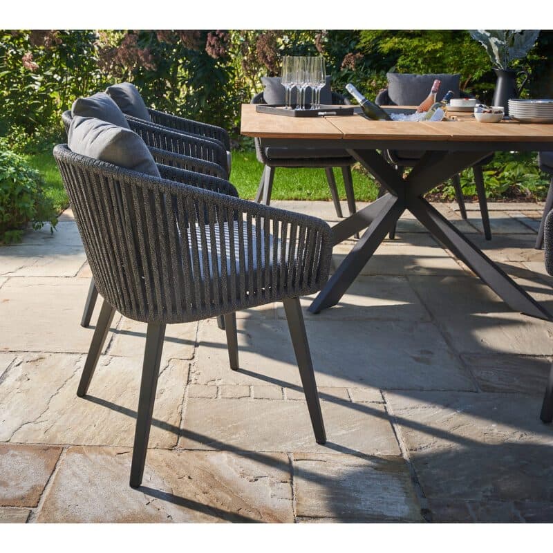 CASA DOMA "Ribera/Siderno" Diningset 9-tlg., Gestelle Edelstahl anthrazit, Diningsessel Rundform, Vierkant-Beine Edelstahl anthrazit, Sitz Rope anthrazit (vertikal breit), Kissen Tuvatextil® Panama grafito, Tischplatte Teak