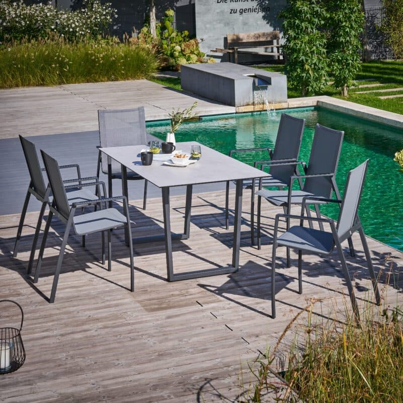 CASA DOMA "Mineo/Falerna" Gartenmöbel-Set 7-tlg., Gestelle Edelstahl anthrazit, Sunproof® Sling schwarz/silber, Armlehne Aluminium-Einlage schwarz, Kufentisch 160x90 cm mit HPL-Tischplatte