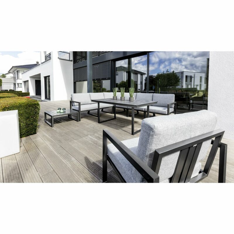 Kettler "Ocean Skid Modular" Loungeserie, Gestell Aluminium anthrazit, Polster hellgrau meliert, Armlehnen Aluminium, Tisch "Skate"