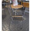 Diamond Garden "Atlanta" Stapelstuhl, Gestell Edelstahl, Bespannung Rope mocca, Teak-Armlehnen – Ausstellung Karlsruhe